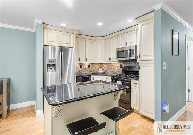 Photo 4 of Condo for sale at 2 Sheffield Ct, North Brunswick, NJ 08902 | MLS# 2662438M | Listing updated on 2026-07-24