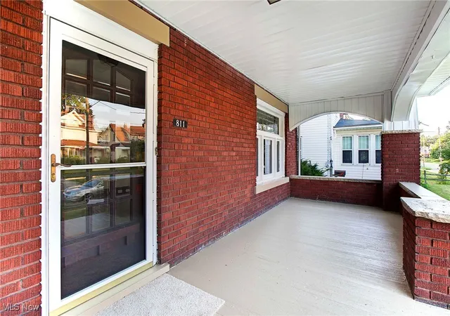 Photo 3 of Single family home for sale at 811 Broad Ave Nw, Canton, OH 44708 | MLS# 5146913 | Listing updated on 2025-11-14