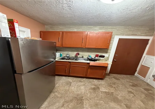 Listing Photo 5 - Condo for sale in building located at 14520 Dover Ave, Cleveland, OH 44112