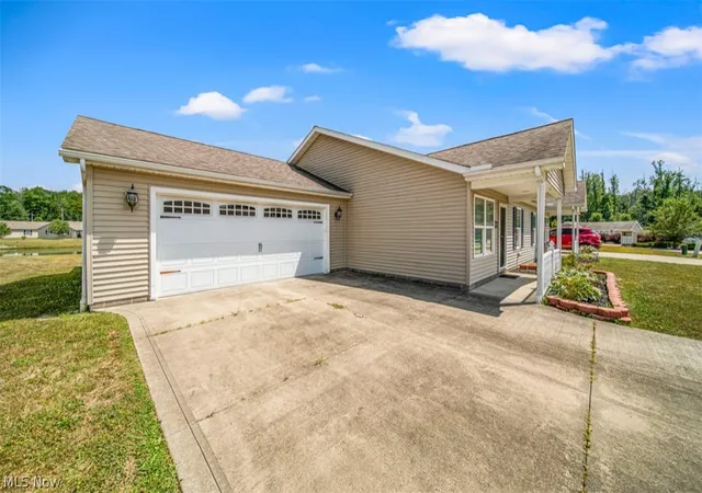 3rd image of 309 Woodland Wy, Jefferson, OH 44047