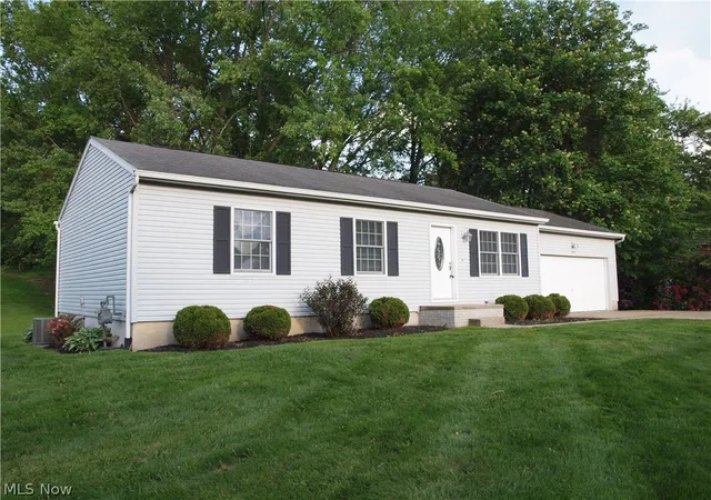 Photo 3 of Single family home for sale at 1422 Woodlawn Ave NW, Canton, OH 44708 | MLS# 5210812 | Listing updated on 2026-09-19