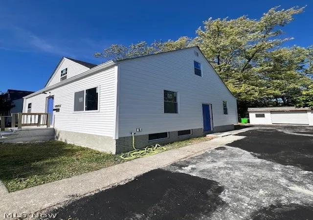 Photo 3 of Single family home for sale at 19819 Harvard Ave, Warrensville Heights, OH 44122 | MLS# 5214544 | Listing updated on 2026-09-23