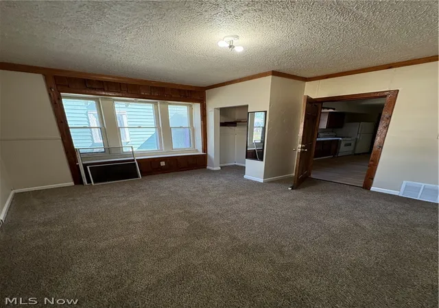 Photo 4 of Single family home for sale at 565 Brown St, Akron, OH 44311 | MLS# 5214911 | Listing updated on 2026-07-06