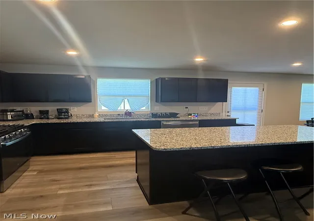 3rd image of 3293 Stafford Dr, Lakemore, OH 44312 | MLS# 5216270