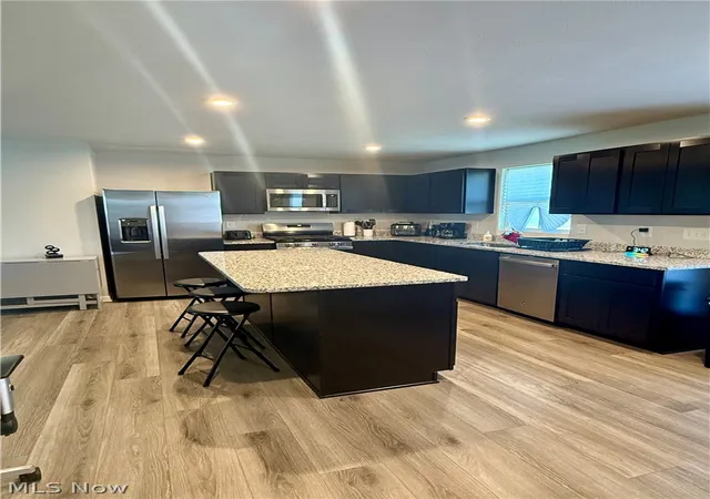 4th image of 3293 Stafford Dr, Lakemore, OH 44312 | MLS# 5216270