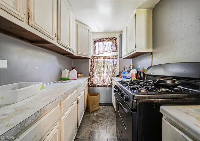 Photo 3 of Single family home for sale at 9404 Benham Ave, Cleveland, OH 44105 | MLS# 5215153 | Listing updated on 2026-06-05