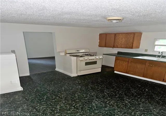 Photo 4 of House for sale at 130 Ira Ave, Akron, OH 44301 | MLS# 5216804 | Listing updated on 2026-07-10