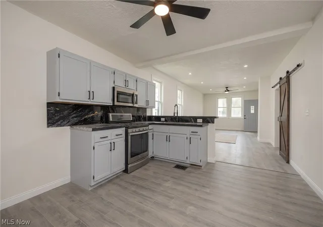 Photo 3 of Single family home for sale at 1266 E 102nd Street, Cleveland, OH 44108 | MLS# 5220588 | Listing updated on 2026-06-20