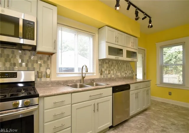 Photo 3 of Single family home for sale at 9817 Cudell Ave, Cleveland, OH 44102 | MLS# 5219995 | Listing updated on 2026-09-27