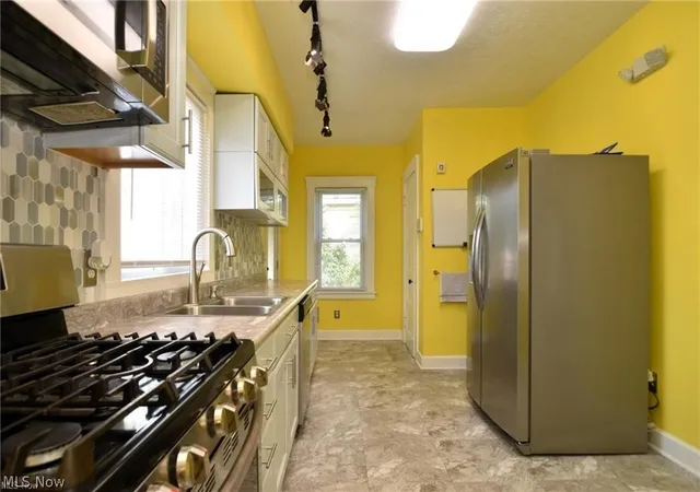 Photo 4 of Single family home for sale at 9817 Cudell Ave, Cleveland, OH 44102 | MLS# 5219995 | Listing updated on 2026-09-27