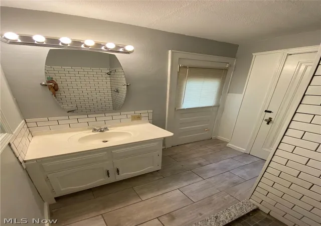 Photo 3 of Single family home for sale at 493 Rentschler St, Akron, OH 44304 | MLS# 5221266 | Listing updated on 2026-06-23
