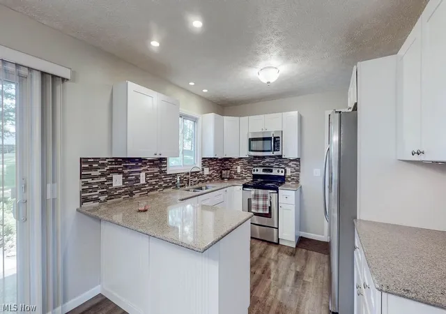 Photo 4 of Single family home for sale at 2045 Howard St NE, Hartville, OH 44632 | MLS# 5223772 | Listing updated on 2026-09-27
