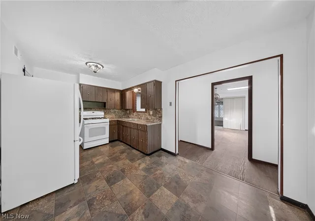Photo 3 of House for sale at 134-136 Brookfield St, Louisville, OH 44641 | MLS# 5224142 | Listing updated on 2026-07-17