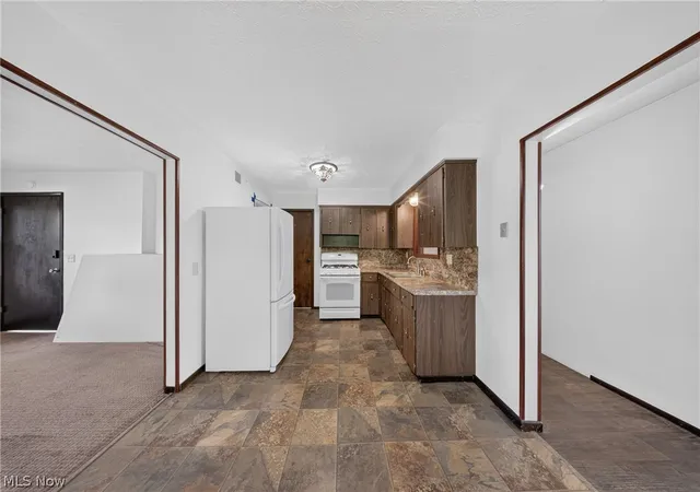 Photo 4 of House for sale at 134-136 Brookfield St, Louisville, OH 44641 | MLS# 5224142 | Listing updated on 2026-07-17