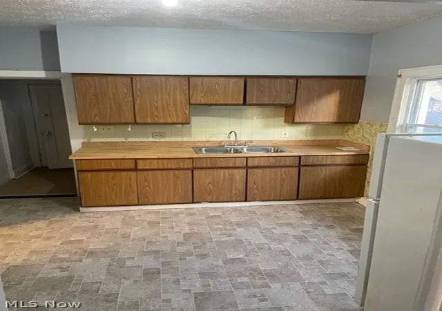 Photo 4 of House for sale at 407 E 147th Street, Cleveland, OH 44110 | MLS# 5226255 | Listing updated on 2026-07-16