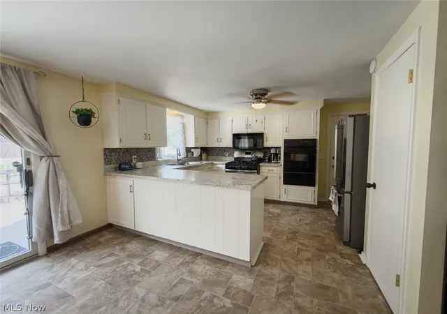 Photo 4 of Sale Pending at 4935 Quincy St NW, Canton, OH 44708 | MLS# 5227796 | Listing updated on 2026-09-16