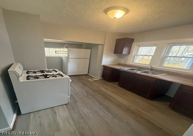 Photo 3 of Single family home for sale at 702 Grace Ave, Akron, OH 44320 | MLS# 5227809 | Listing updated on 2026-07-18