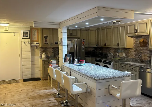 Listing Photo 1 - Condo for sale in building located at 12900 Lake Ave, Lakewood, OH 44107 - Unit #915