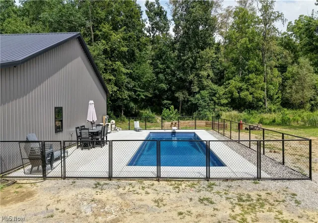 Photo 4 of Single family home for sale at 6168 SE Buckeye Holw Rd, Uhrichsville, OH 44683 | MLS# 5230030 | Listing updated on 2026-09-15