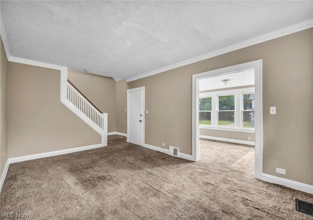 Photo 2 of Single family home for sale at 12801 Christine Ave, Garfield Heights, OH 44105 | MLS# 5231919 | Listing updated on 2026-08-28