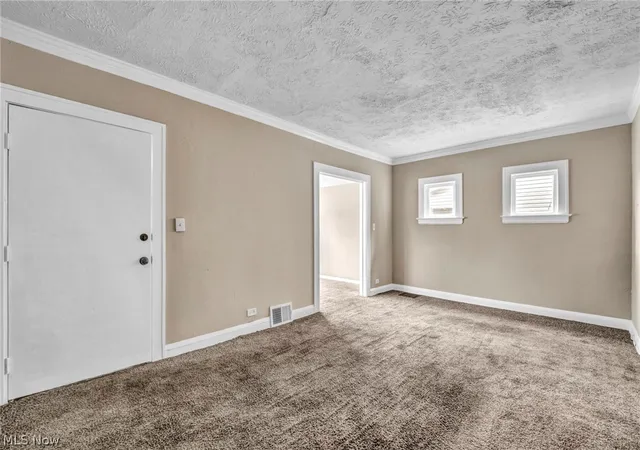 Photo 3 of Single family home for sale at 12801 Christine Ave, Garfield Heights, OH 44105 | MLS# 5231919 | Listing updated on 2026-08-28