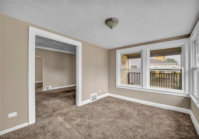 Photo 3 of Single family home for sale at 12801 Christine Ave, Garfield Heights, OH 44105 | MLS# 5231919 | Listing updated on 2026-08-28