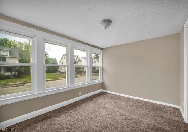 Photo 4 of Single family home for sale at 12801 Christine Ave, Garfield Heights, OH 44105 | MLS# 5231919 | Listing updated on 2026-08-28