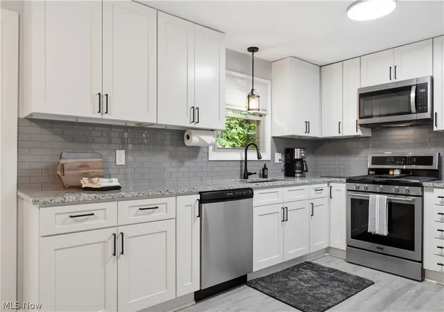 Photo 3 of Single family home for sale at 8173 Spencer Ave Nw, North Canton, OH 44720 | MLS# 5232940 | Listing updated on 2026-10-06