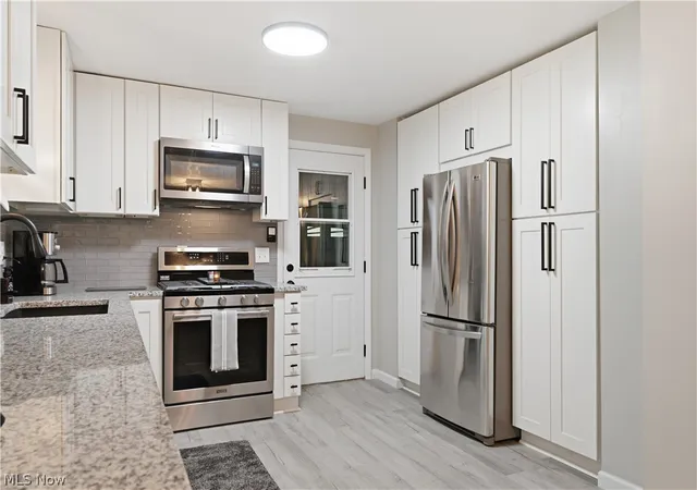 Single family home for sale at 8173 Spencer Ave NW, North Canton, OH 44720 | MLS# 5232940 | Listing updated on 2026-10-06