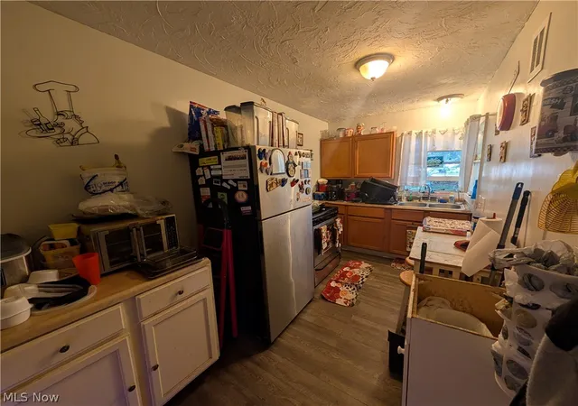 Photo 4 of Single family home for sale at 15321 Ridpath Ave, Cleveland, OH 44110 | MLS# 5233383 | Listing updated on 2026-08-14