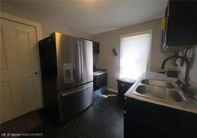 Photo 4 of Single family home for sale at 1203 Woodland St NW, Warren, OH 44483 | MLS# 5233291 | Listing updated on 2026-08-07