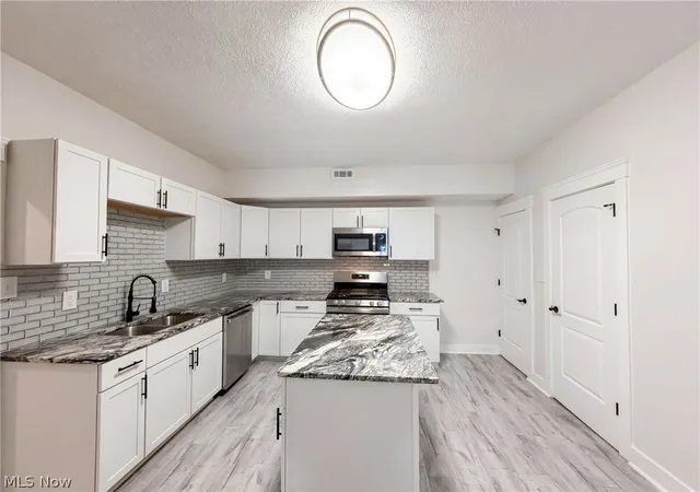 Photo 2 of Single family home for sale at 3407 Erin Ave, Cleveland, OH 44113 | MLS# 5234349 | Listing updated on 2026-08-06