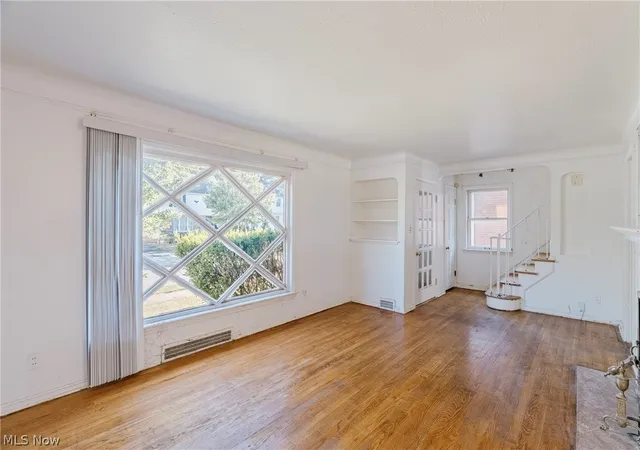 Photo 3 of Single family home for sale at 3826 Grosvenor Rd, Cleveland, OH 44118 | MLS# 5233747 | Listing updated on 2026-08-25