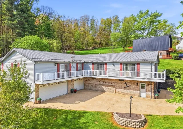 Photo 2 of Single family home for sale at 411 E Mohawk Dr, Malvern, OH 44644 | MLS# 5234680 | Listing updated on 2026-08-13