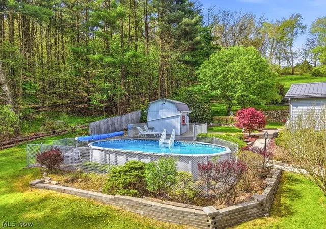 Photo 3 of Single family home for sale at 411 E Mohawk Dr, Malvern, OH 44644 | MLS# 5234680 | Listing updated on 2026-08-13