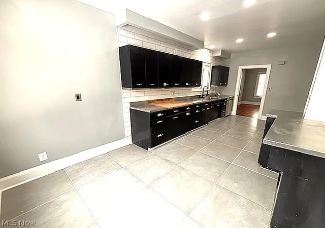 Photo 4 of Single family home for sale at 15703 Hazel Rd, Cleveland, OH 44112 | MLS# 5235837 | Listing updated on 2026-09-01