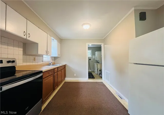 Photo 4 of Single family home for sale at 1263 Oxford Dr, Madison, OH 44057 | MLS# 5235790 | Listing updated on 2026-10-01