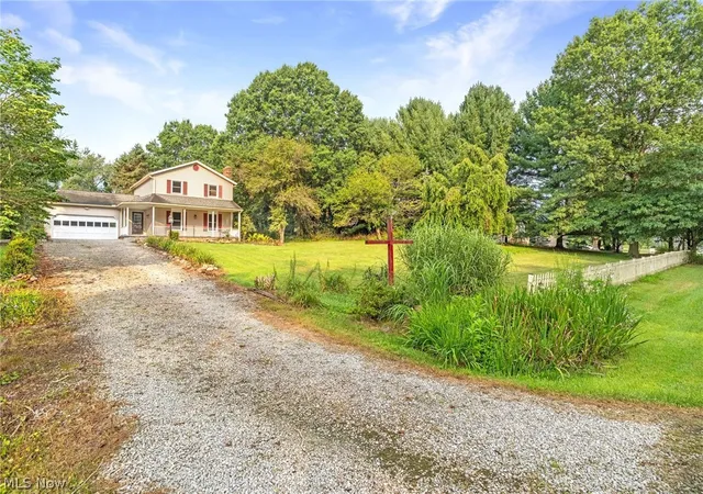 Photo 1 of Single family home for sale at 1404 Kristen Cir, Mogadore, OH 44260 | MLS# 5236751 | Listing updated on 2026-08-17