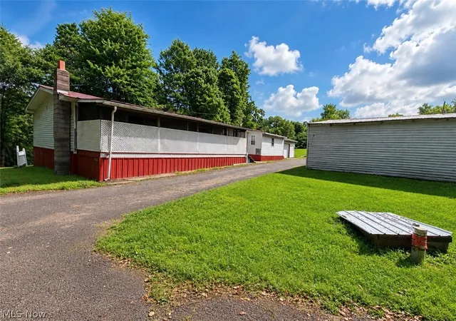 Photo 2 of Single family home for sale at 1080 Lumen Rd Nw, Minerva, OH 44657 | MLS# 5237419 | Listing updated on 2026-08-19