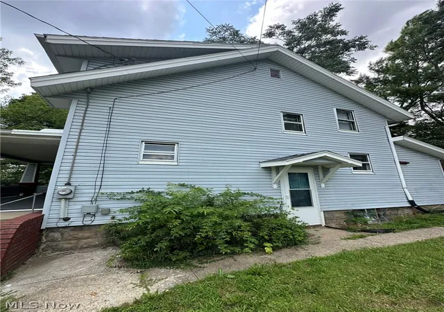 Photo 2 of Single family home for sale at 875 Mckinley Ave, Akron, OH 44306 | MLS# 5232615 | Listing updated on 2026-08-21