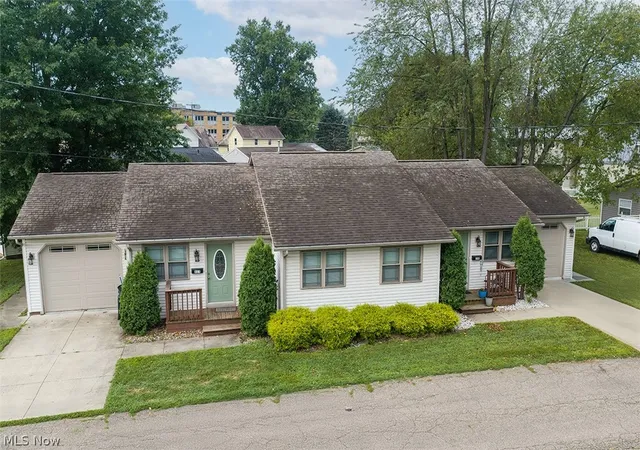 Photo 2 of Multi family home for sale at 314   318 Esther Ct Nw, New Philadelphia, OH 44663 | MLS# 5238505 | Listing updated on 2026-08-28