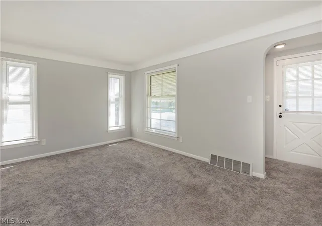Photo 3 of Single family home for sale at 8207 Garfield Blvd, Garfield Heights, OH 44125 | MLS# 5238905 | Listing updated on 2026-08-25