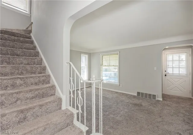 Photo 4 of Single family home for sale at 8207 Garfield Blvd, Garfield Heights, OH 44125 | MLS# 5238905 | Listing updated on 2026-08-25