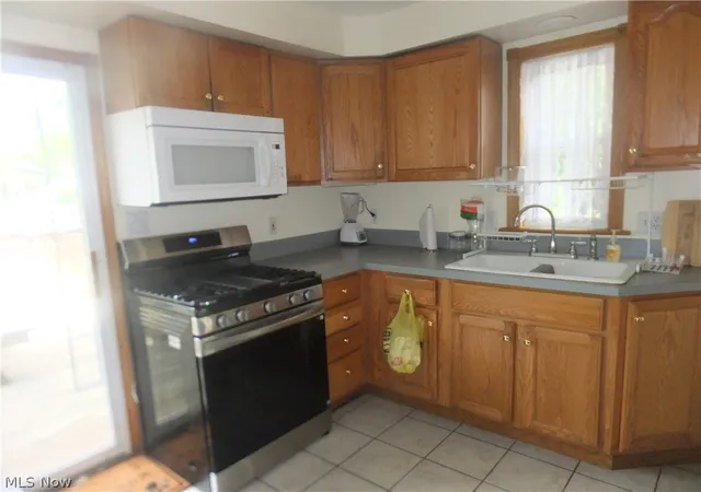 Photo 2 of Single family home for sale at 12927 Grannis Rd, Garfield Heights, OH 44125 | MLS# 5238707 | Listing updated on 2026-08-25