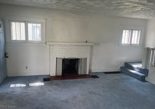 Photo 3 of Single family home for sale at 912 S Hawkins Ave, Akron, OH 44320 | MLS# 5239321 | Listing updated on 2026-09-30