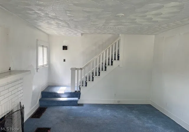 Photo 4 of Single family home for sale at 912 S Hawkins Ave, Akron, OH 44320 | MLS# 5239321 | Listing updated on 2026-09-30
