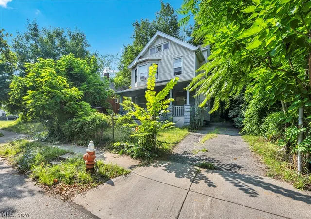 Photo 2 of Single family home for sale at 9822 Raymond Ave, Cleveland, OH 44104 | MLS# 5239374 | Listing updated on 2026-08-25