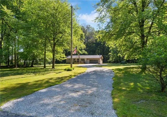 Single family home for sale at 1075 River Rd, Lake Milton, OH 44429 | MLS# 5239517