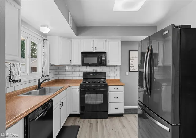 Photo 3 of Sale Pending at 9011 Roedean Dr, Parma, OH 44129 | MLS# 5237005 | Listing updated on 2026-09-01