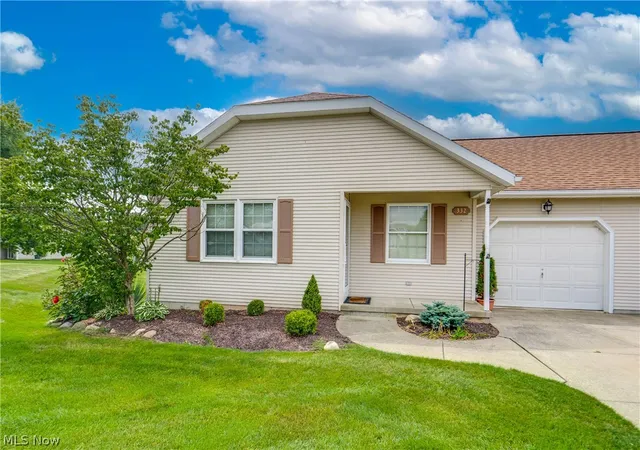 Photo 3 of Sale Pending at 332 W Heatherwood Dr, Barberton, OH 44203 | MLS# 5239814 | Listing updated on 2026-10-04